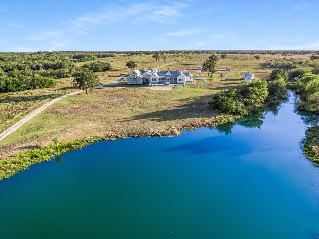 314 Big Sky Ranch Road Smithville, TX 78957 - Photo 2 of 40 a view of an ocean and beach