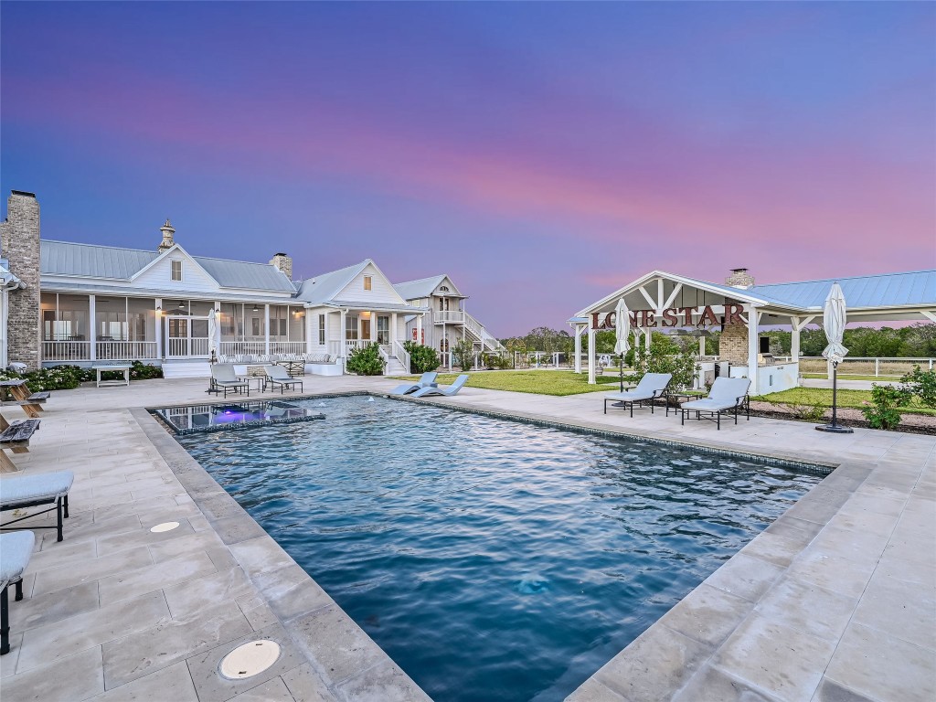 314 Big Sky Ranch Road Smithville, TX 78957 - Photo 28 of 40 a view of a house with a yard and sitting area