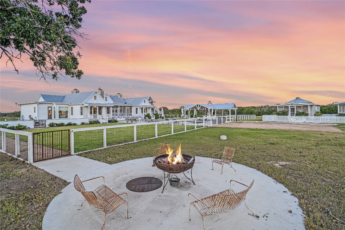 314 Big Sky Ranch Road Smithville, TX 78957 - Photo 36 of 40 a view of a lake with a house