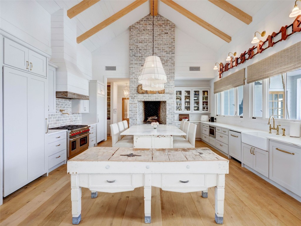 314 Big Sky Ranch Road Smithville, TX 78957 - Photo 8 of 40 a view of a dining room with furniture window and wooden floor
