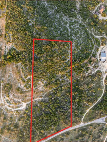 a street sign that is on the side of a road