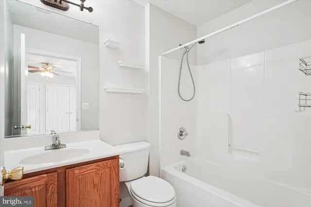 a bathroom with a sink a vanity and a mirror