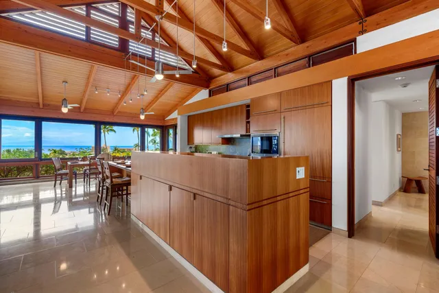 a view of an ocean from a dining room