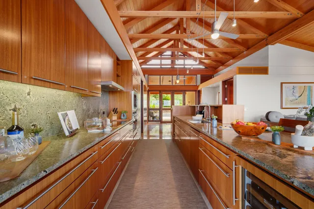 a kitchen with a stove and a microwave