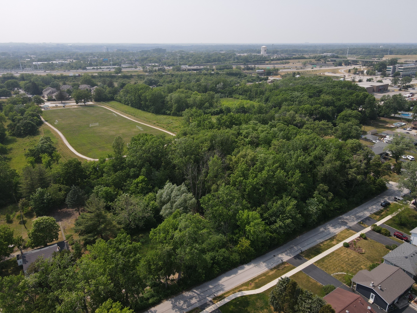 Lot 7 Drendel Road Downers Grove, IL 60516 - Photo 3 of 5 an aerial view of residential houses with outdoor space and trees