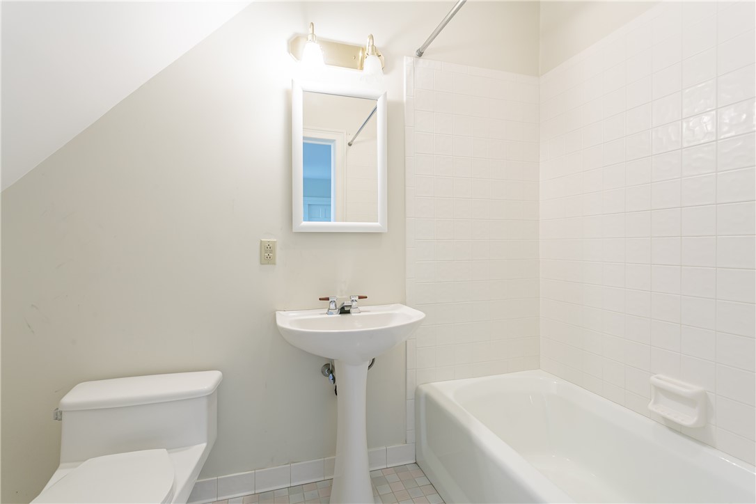 445 5 Points Road Rush, NY 14543 - Photo 24 of 40 Second floor bath with tub/shower and pedestal sin