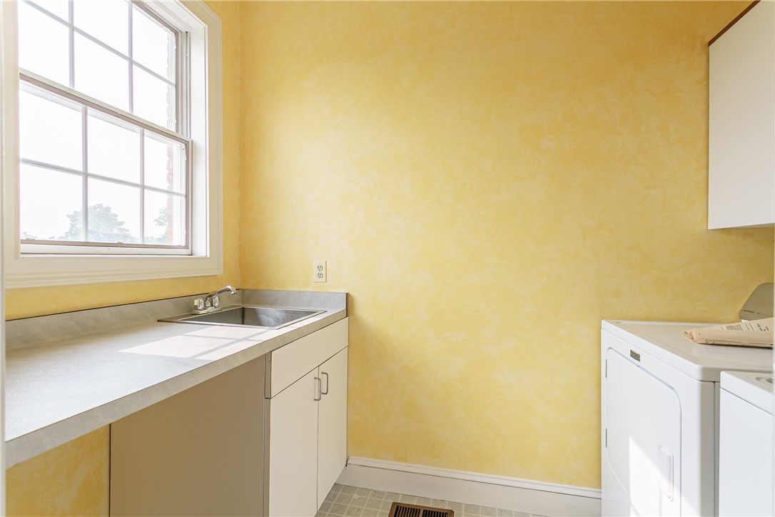 445 5 Points Road Rush, NY 14543 - Photo 27 of 40 Laundry room on first floor includes sink and fold