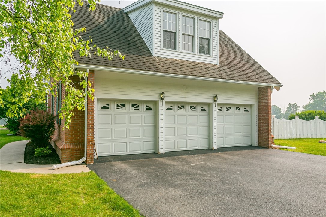 445 5 Points Road Rush, NY 14543 - Photo 35 of 40 The 3 bay garage with remote openers offers plenty