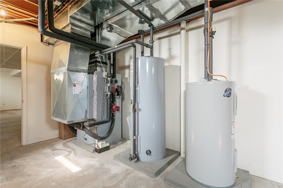 445 5 Points Road Rush, NY 14543 - Photo 37 of 40 Geothermal heating and cooling unit and water tank