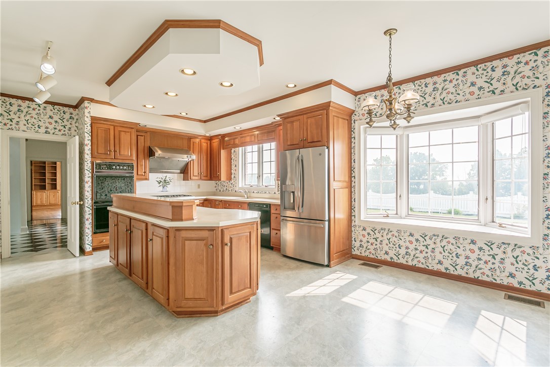 445 5 Points Road Rush, NY 14543 - Photo 9 of 40 The eat-in kitchen offers vast space for cooking a