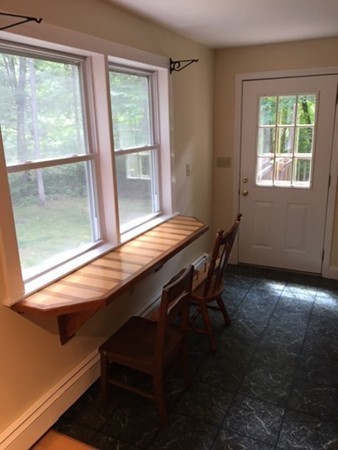 704 Valley Road Barre, MA 01005 - Photo 7 of 19 a room with wooden floor and a window