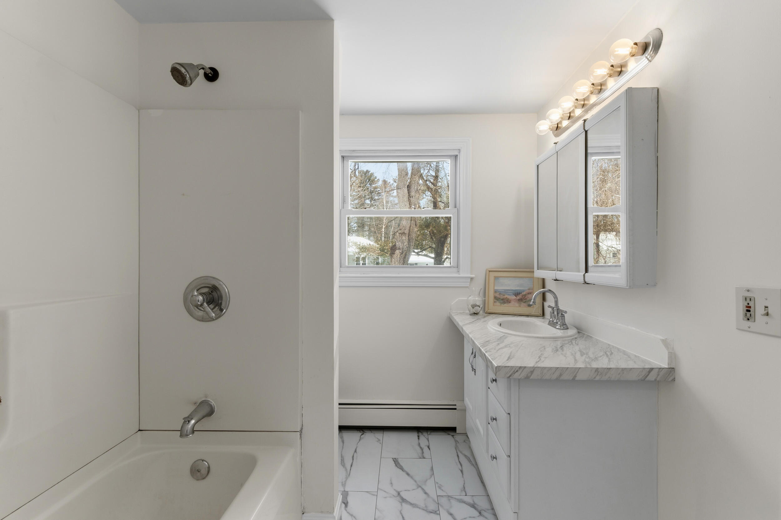 54 Granby Road South Portland, ME 04106 - Photo 11 of 40 New luxe vinyl, updated bath