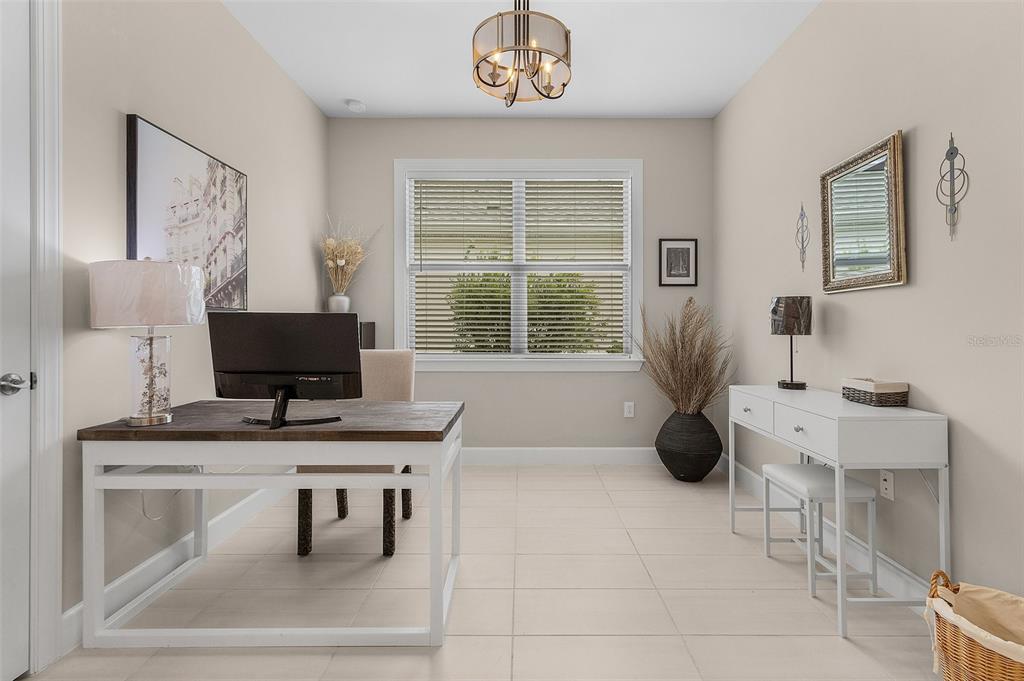 42211 Edgewater Drive Punta Gorda, FL 33982 - Photo 14 of 36 a workspace with furniture and window