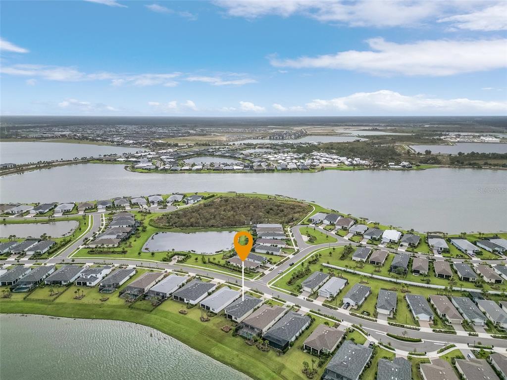 42211 Edgewater Drive Punta Gorda, FL 33982 - Photo 26 of 36 an aerial view of ocean and residential houses with outdoor space