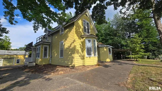 a view of a house with a park