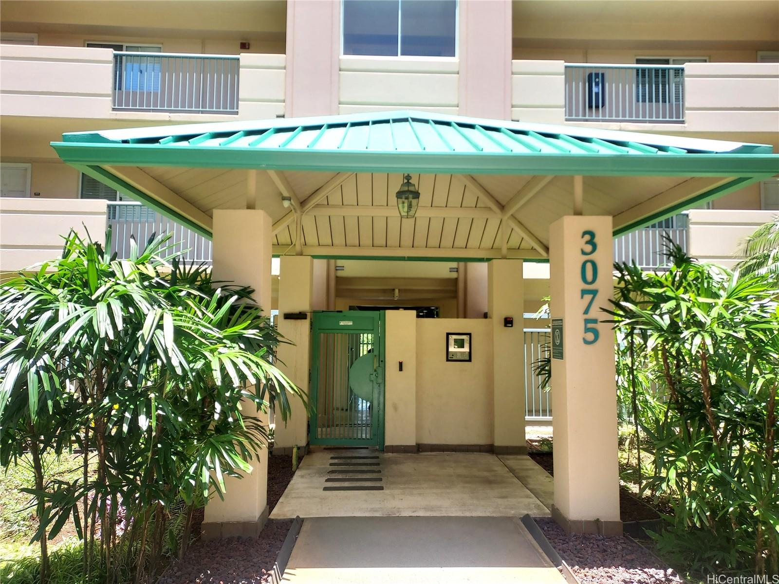 3075 Ala Poha Place, Unit 1504 Honolulu, HI 96818 - Photo 17 of 22 a front view of a house with garden