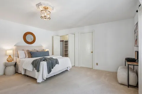 a view of a chair and table on the deck