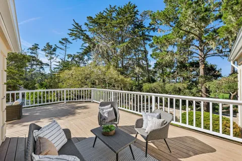 a view of a chairs and table on the wooden floor
