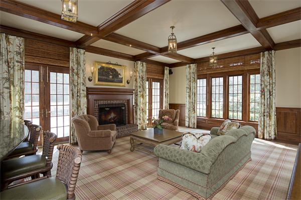 174 Highland Street Weston, MA 02493 - Photo 14 of 29 a living room with furniture and a fireplace