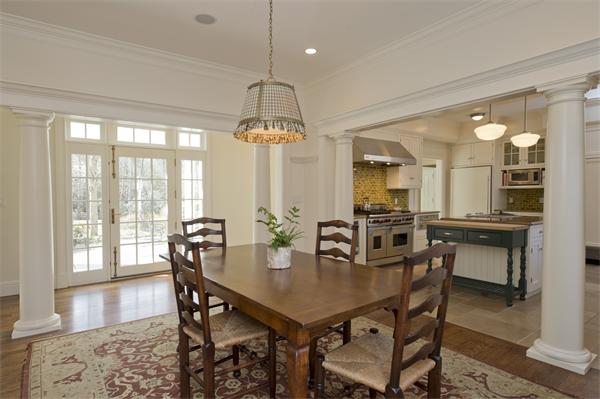 174 Highland Street Weston, MA 02493 - Photo 18 of 29 a view of a dining room with furniture window and wooden floor