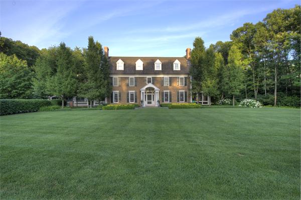 174 Highland Street Weston, MA 02493 - Photo 3 of 29 a view of a park with large trees and a big yard