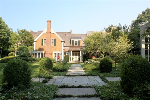 174 Highland Street Weston, MA 02493 - Photo 6 of 29 a front view of a house with a yard