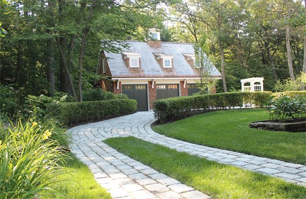 174 Highland Street Weston, MA 02493 - Photo 8 of 29 a front view of a house with a yard