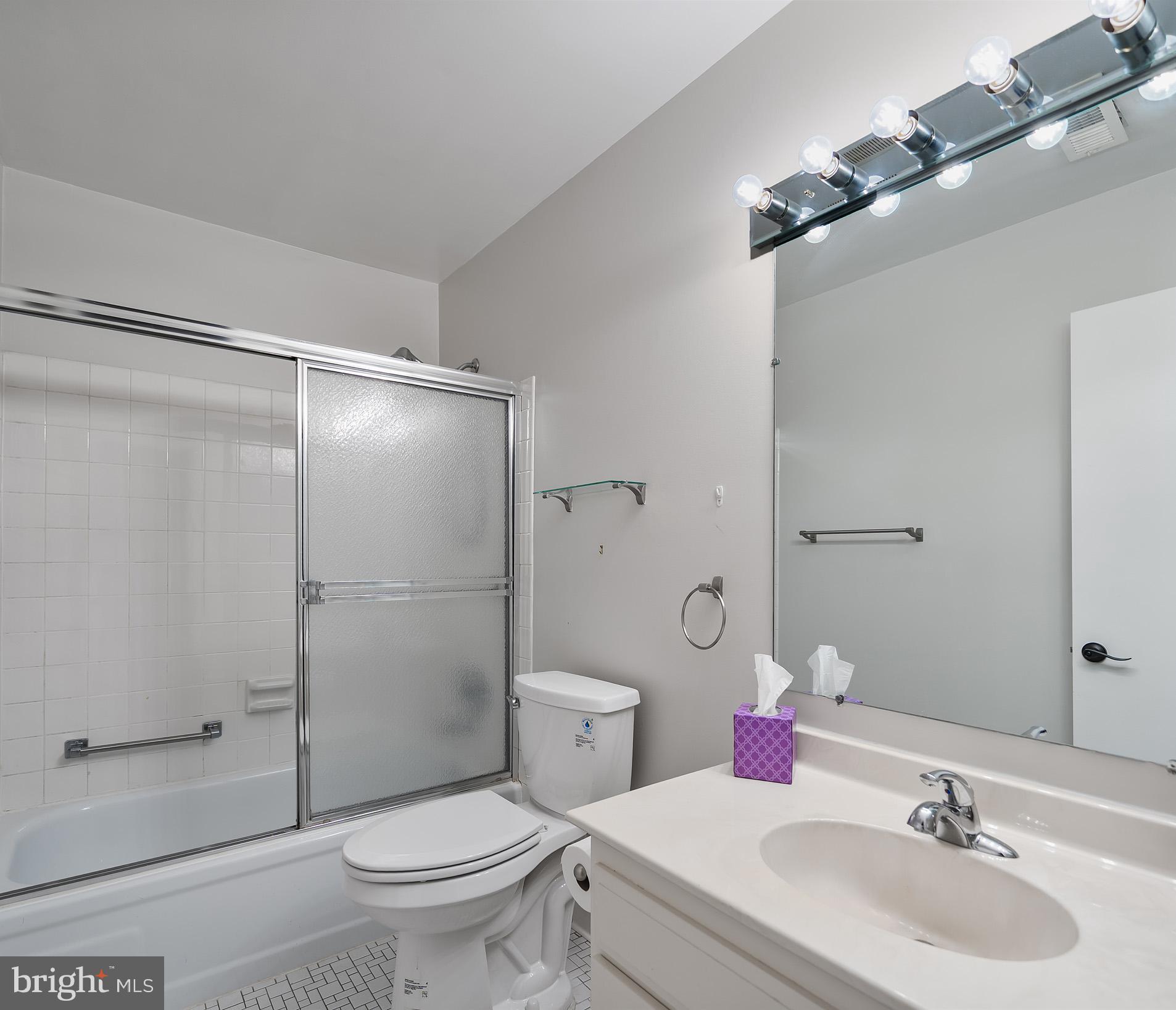 2 Finsbury Park Court, Unit 47A Silver Spring, MD 20906 - Photo 22 of 24 a bathroom with a sink toilet and shower