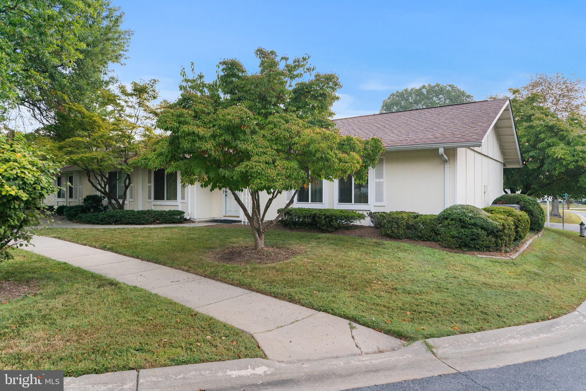 2 Finsbury Park Court, Unit 47A Silver Spring, MD 20906 - Photo 24 of 24 a front view of a house with a yard