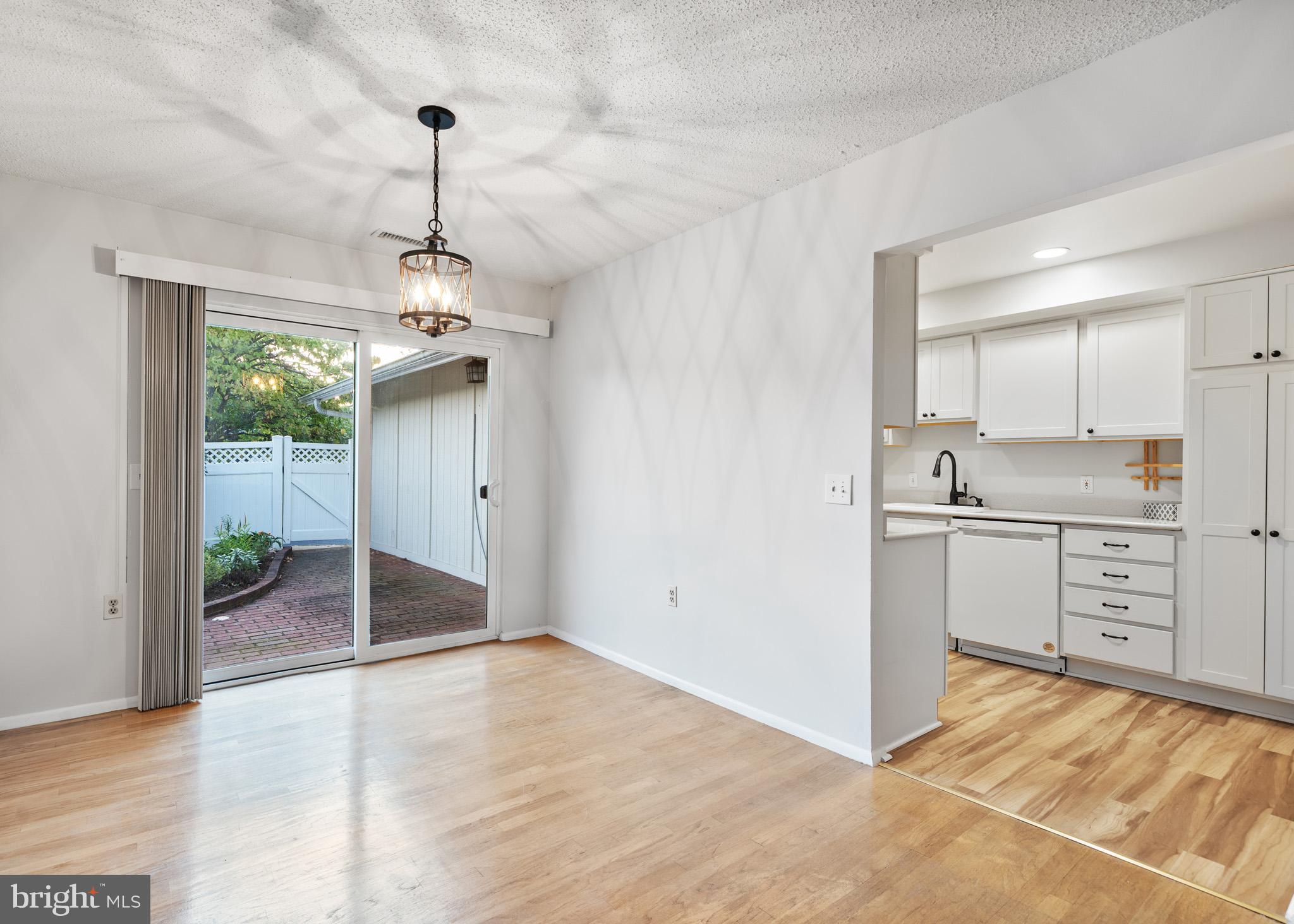 2 Finsbury Park Court, Unit 47A Silver Spring, MD 20906 - Photo 7 of 24 a view of a kitchen with refrigerator and windows