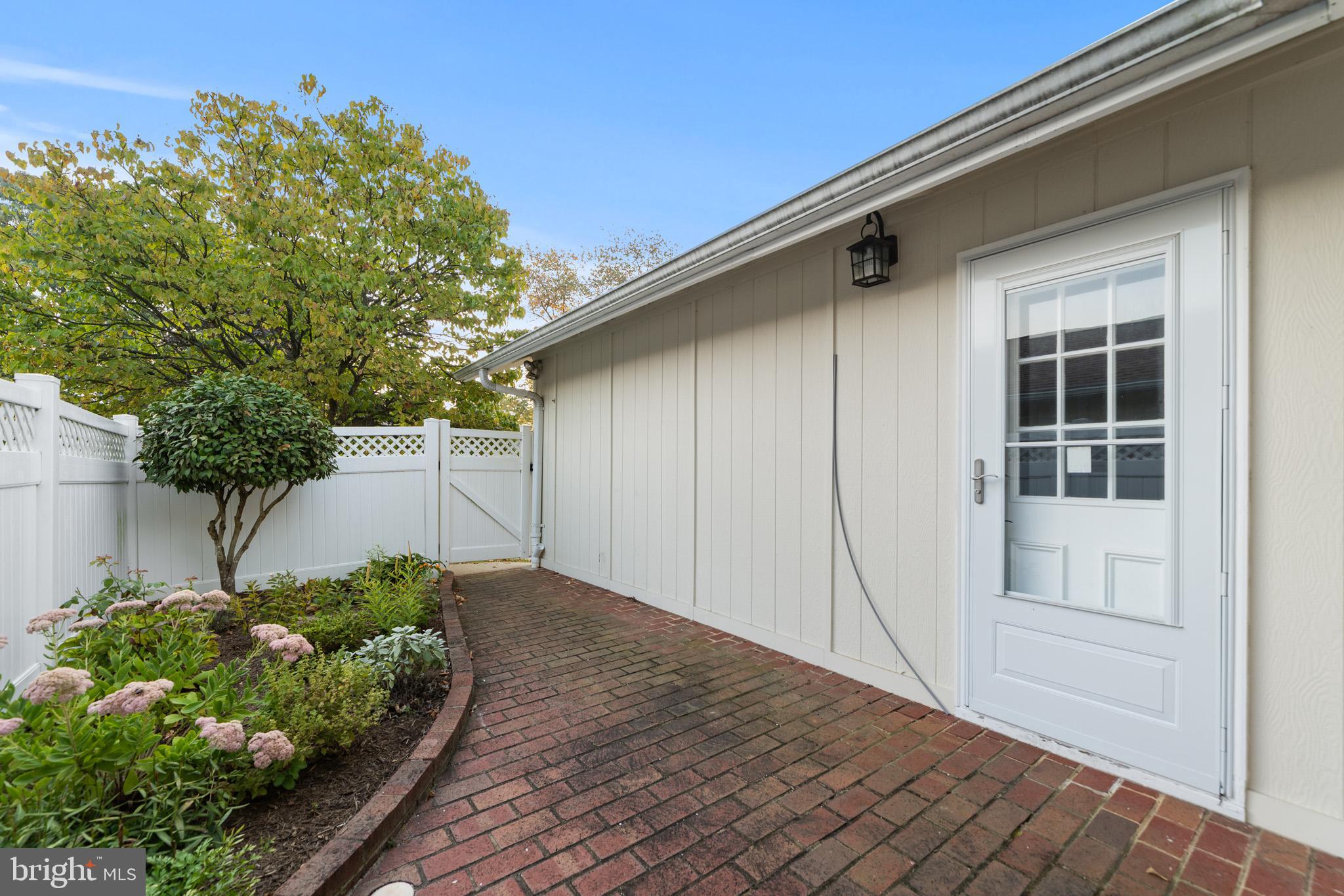 2 Finsbury Park Court, Unit 47A Silver Spring, MD 20906 - Photo 9 of 24 a view of backyard with plants and tree