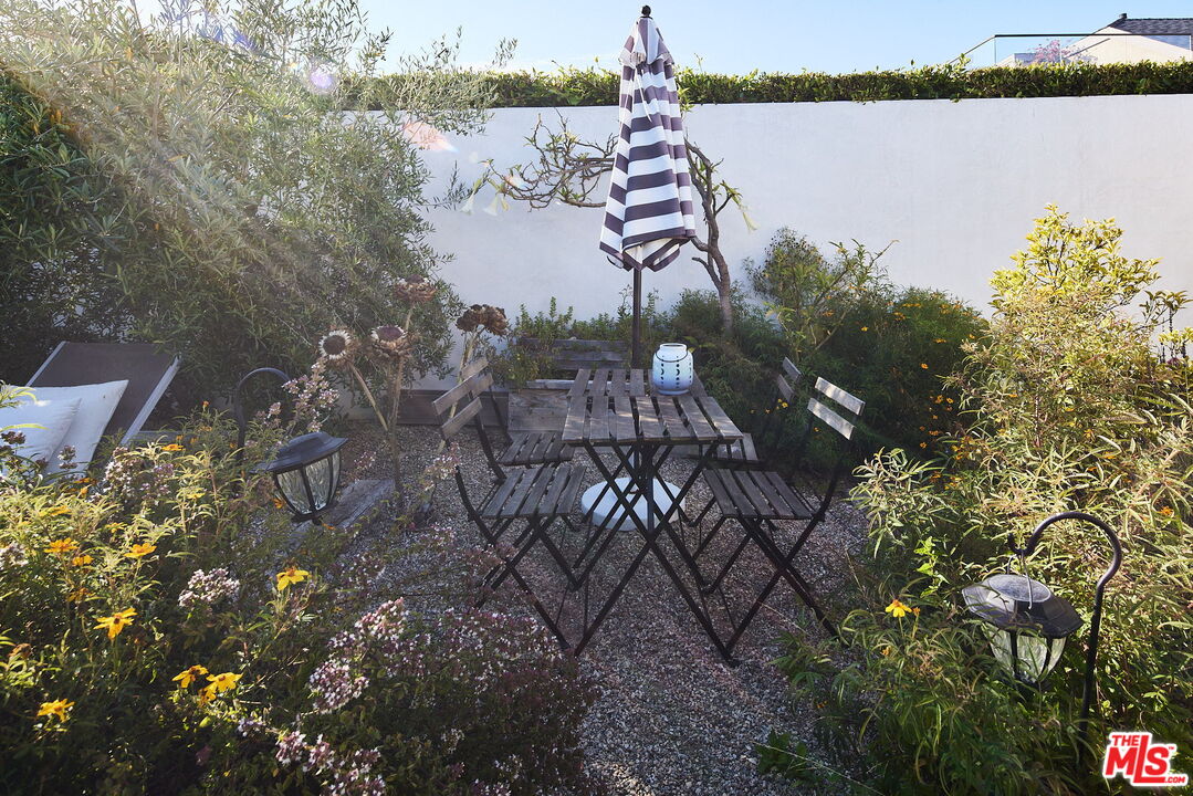 3817 Surfwood Road Malibu, CA 90265 - Photo 19 of 26 a view of a lake with a lake and trees all around