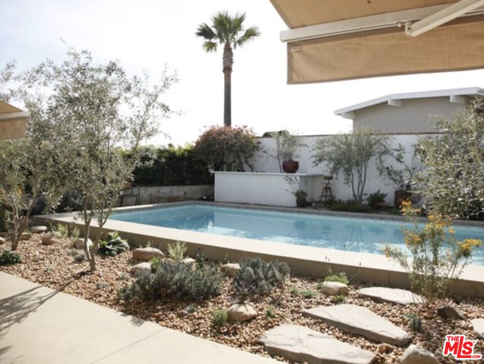 3817 Surfwood Road Malibu, CA 90265 - Photo 20 of 26 a view of a yard with a tree