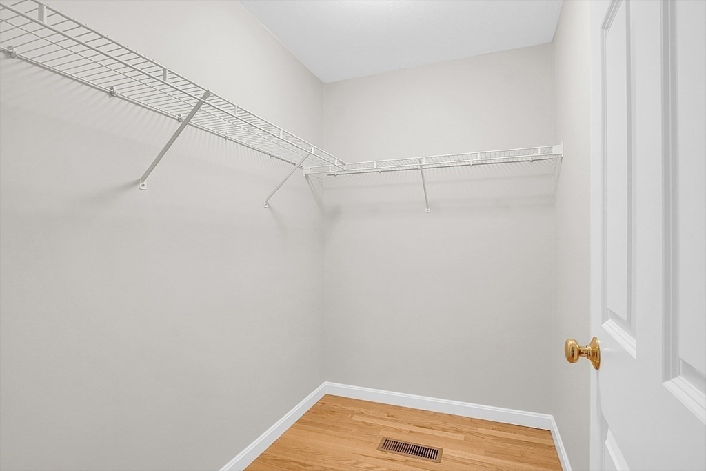 23 Southgate Road, Unit 23 Westford, MA 01886 - Photo 16 of 41 a view of small space with racks on the wall