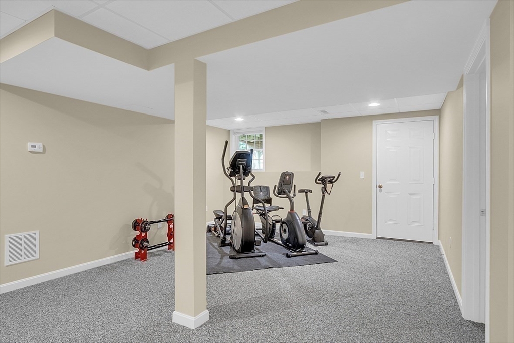 23 Southgate Road, Unit 23 Westford, MA 01886 - Photo 28 of 41 a view of a room with gym equipment