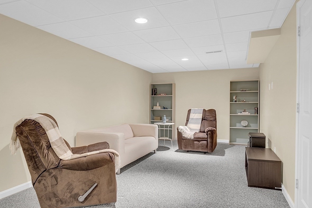 23 Southgate Road, Unit 23 Westford, MA 01886 - Photo 29 of 41 a living room with furniture