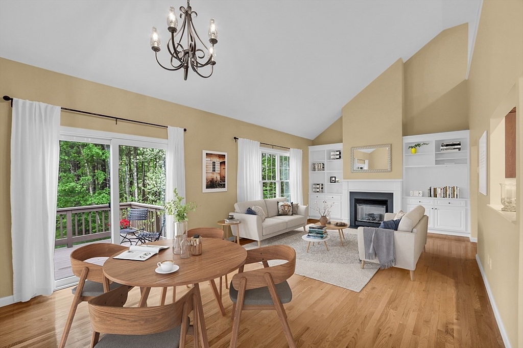 23 Southgate Road, Unit 23 Westford, MA 01886 - Photo 5 of 41 a view of a livingroom with furniture window and wooden floor