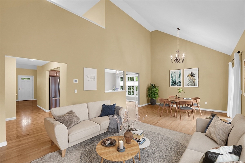 23 Southgate Road, Unit 23 Westford, MA 01886 - Photo 7 of 41 a living room with furniture and a wooden floor