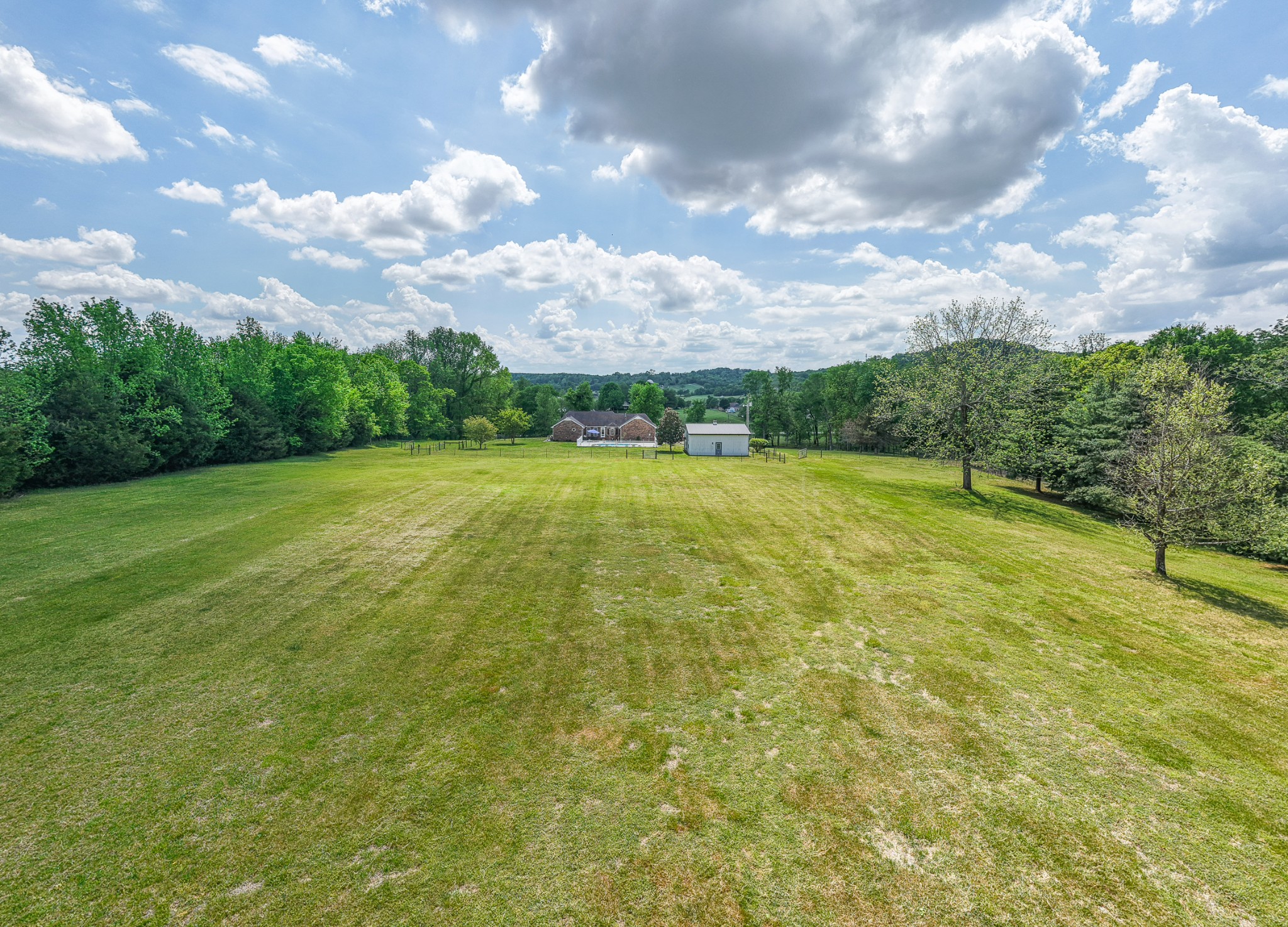 590 Allisona Road Eagleville, TN 37060 - Photo 6 of 55 a view of a field with an trees in the background
