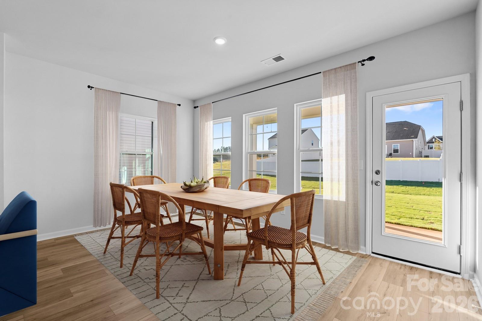 207 Rodeo Drive, Unit 4 Shelby, NC 28150 - Photo 6 of 8 a view of a dining room with furniture and a window
