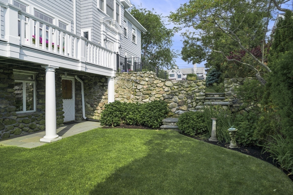 16 Coolidge Road Marblehead, MA 01945 - Photo 30 of 36 a view of a building with a yard