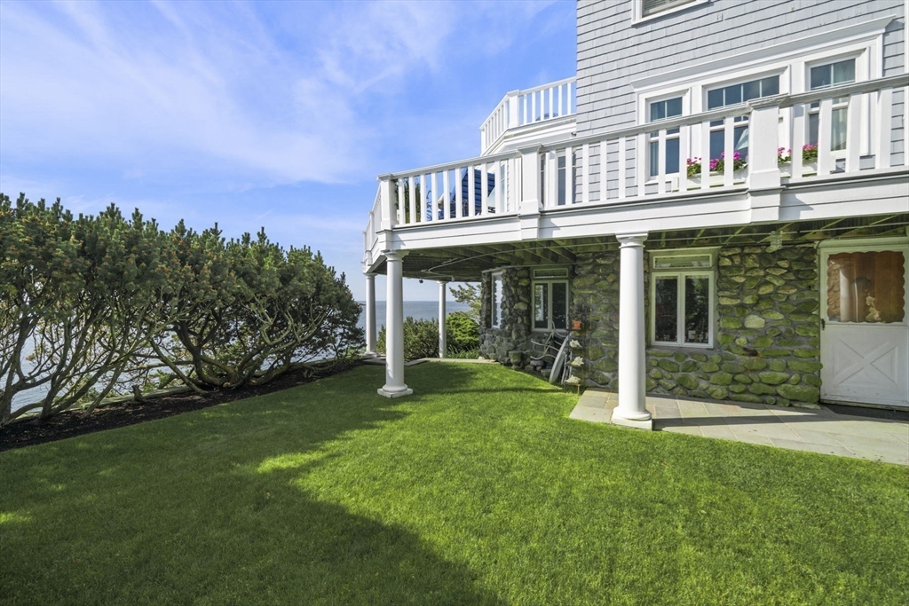 16 Coolidge Road Marblehead, MA 01945 - Photo 31 of 36 a view of a house with a yard and deck