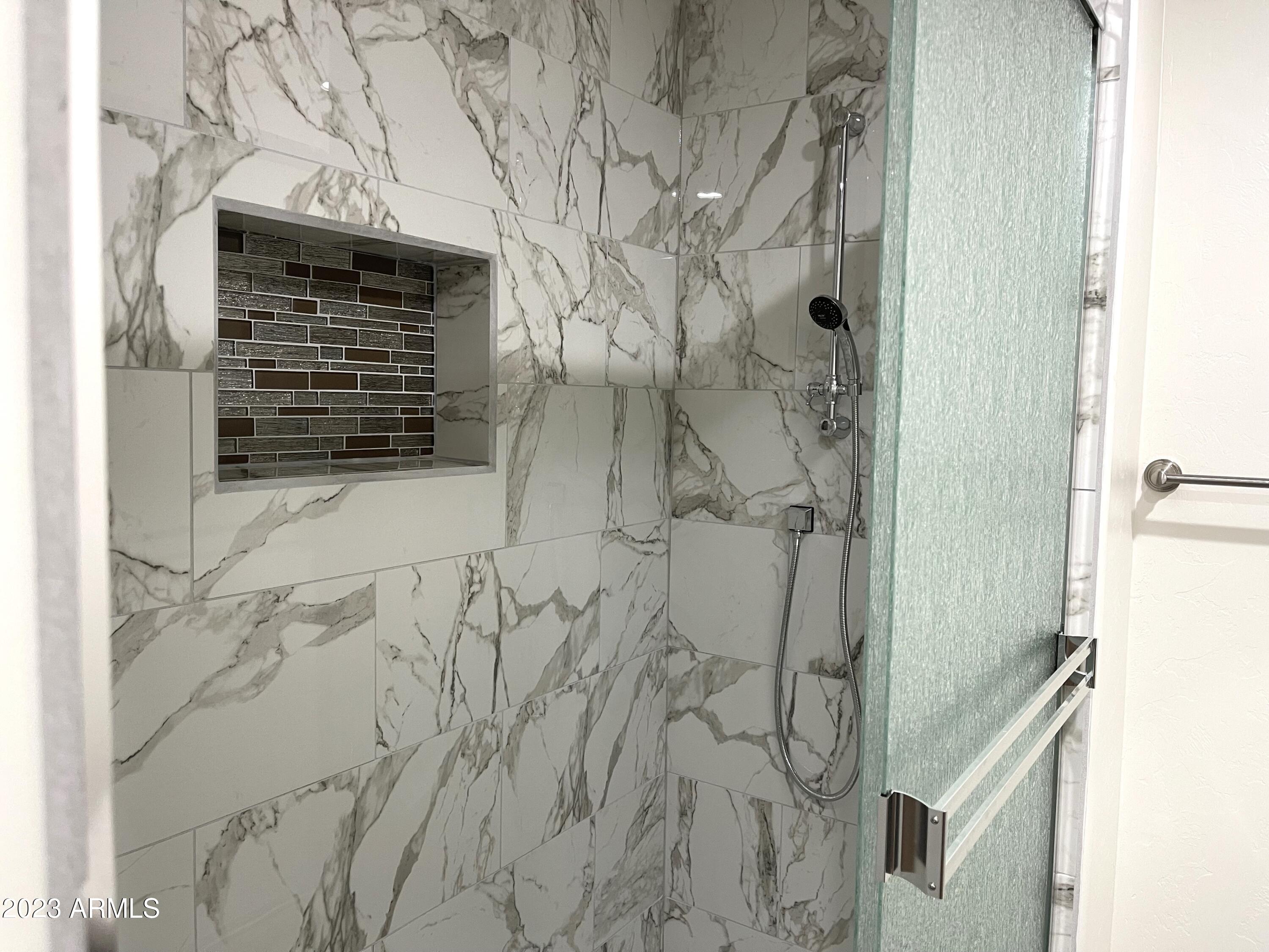 2042 Cobbs Court Rio Rico, AZ 85648 - Photo 30 of 39 a bathroom with a shower