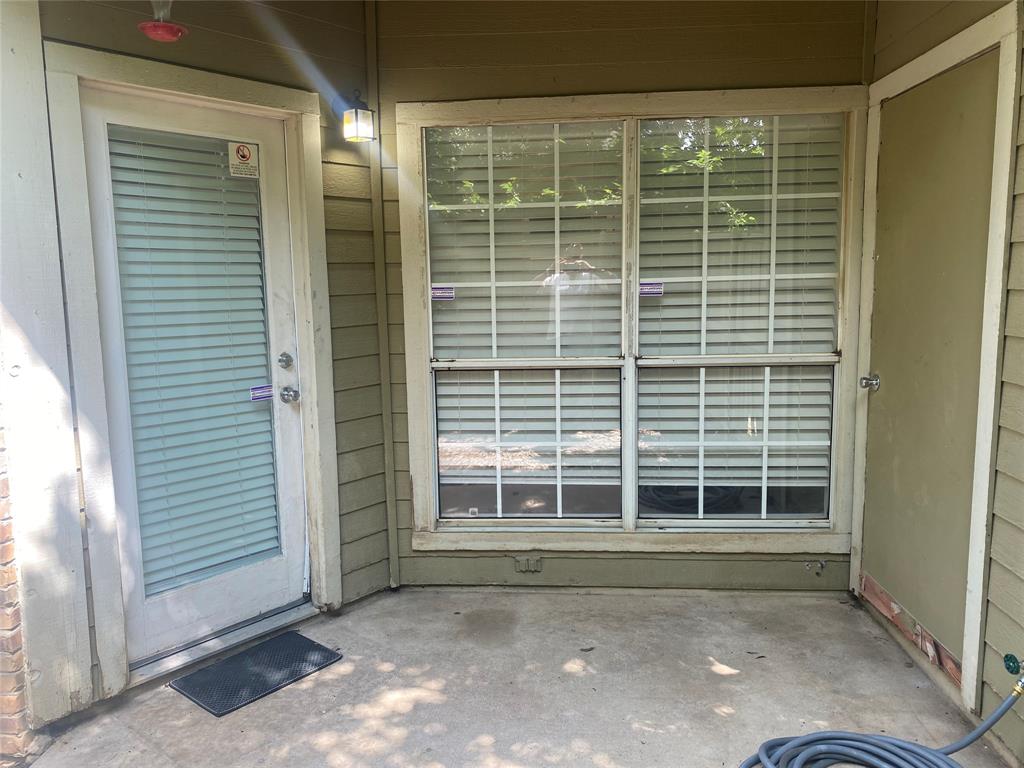 4103 Esters Road, Unit 205 Irving, TX 75038 - Photo 8 of 11 Back patio with yard