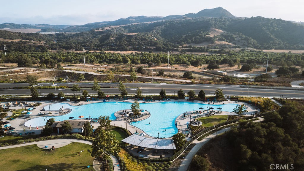 1100 Lasso Way, Unit 204 Rancho Mission Viejo, CA 92694 - Photo 28 of 41 a view of a swimming pool with a mountain