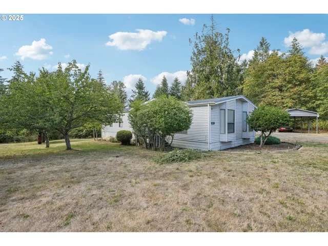 a view of outdoor space with deck and yard