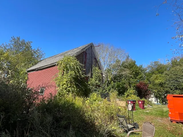 a view of swimming pool with a yard