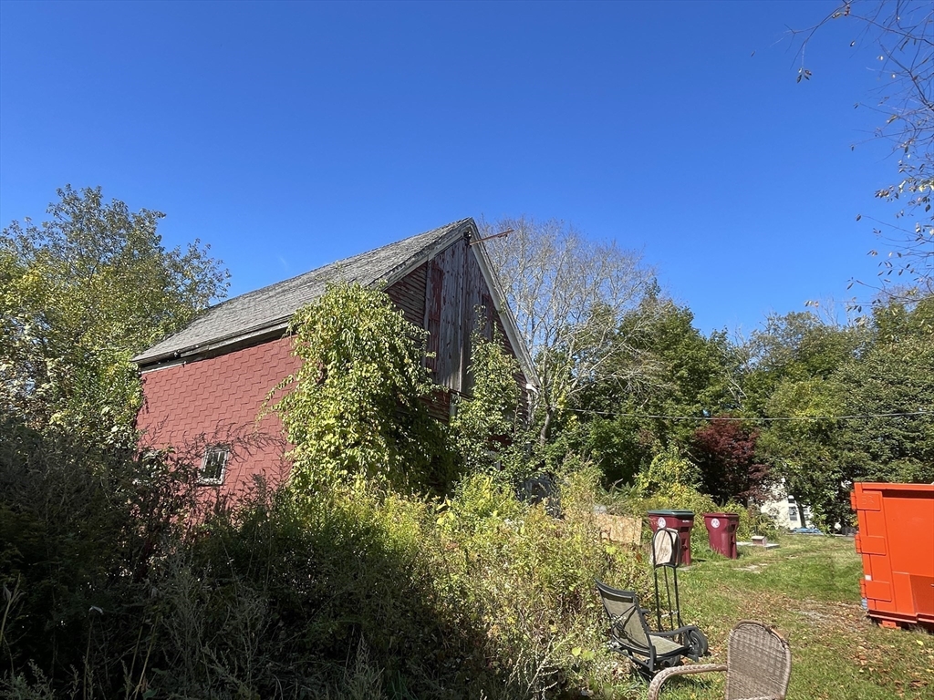 246 Everett Street Middleboro, MA 02346 - Photo 5 of 12 a view of swimming pool with a yard