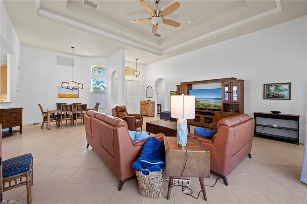 19924 Maddelena Circle Estero, FL 33967 - Photo 13 of 35 a living room with furniture and a flat screen tv