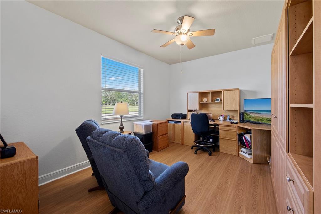 19924 Maddelena Circle Estero, FL 33967 - Photo 25 of 35 a view of a livingroom with workspace and a window